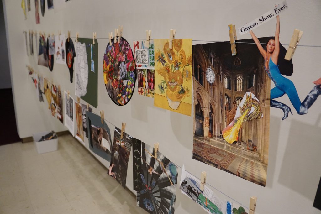 Several vibrant collages are displayed pinned to rows of stings in a white walled gallery.
